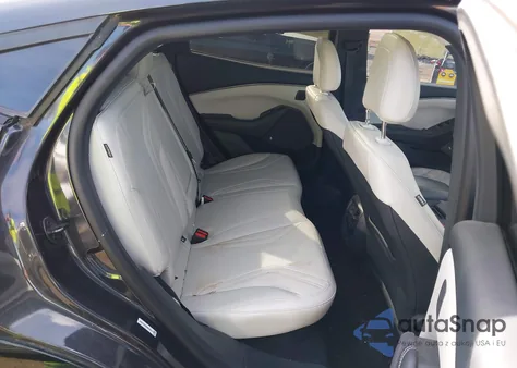 2022 Ford Mustang Mach-E Premium z USA, uszkodzony, nr VIN 3FMTK3SU9NMA49514